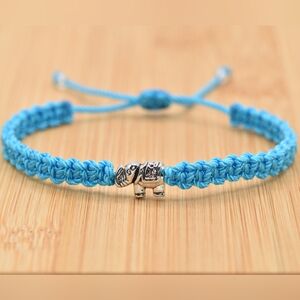 Elephant charm bracelet, light blue string braided bracelet - handmade